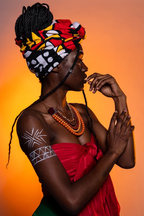 Model Posing in Tribal Jewelry and Headscarf