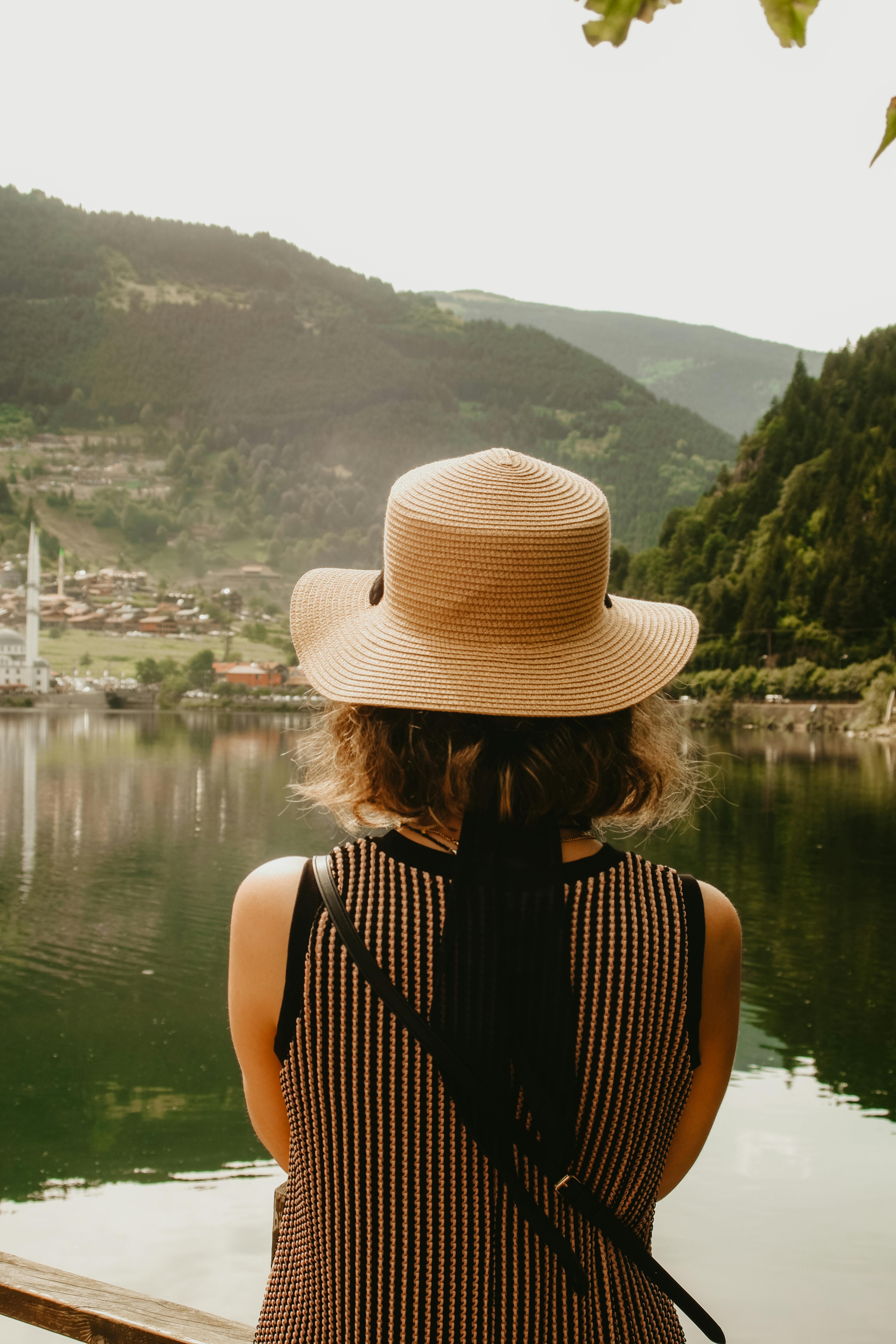 Back of a Young Woman with Sun Hat Stock Image - Image of person