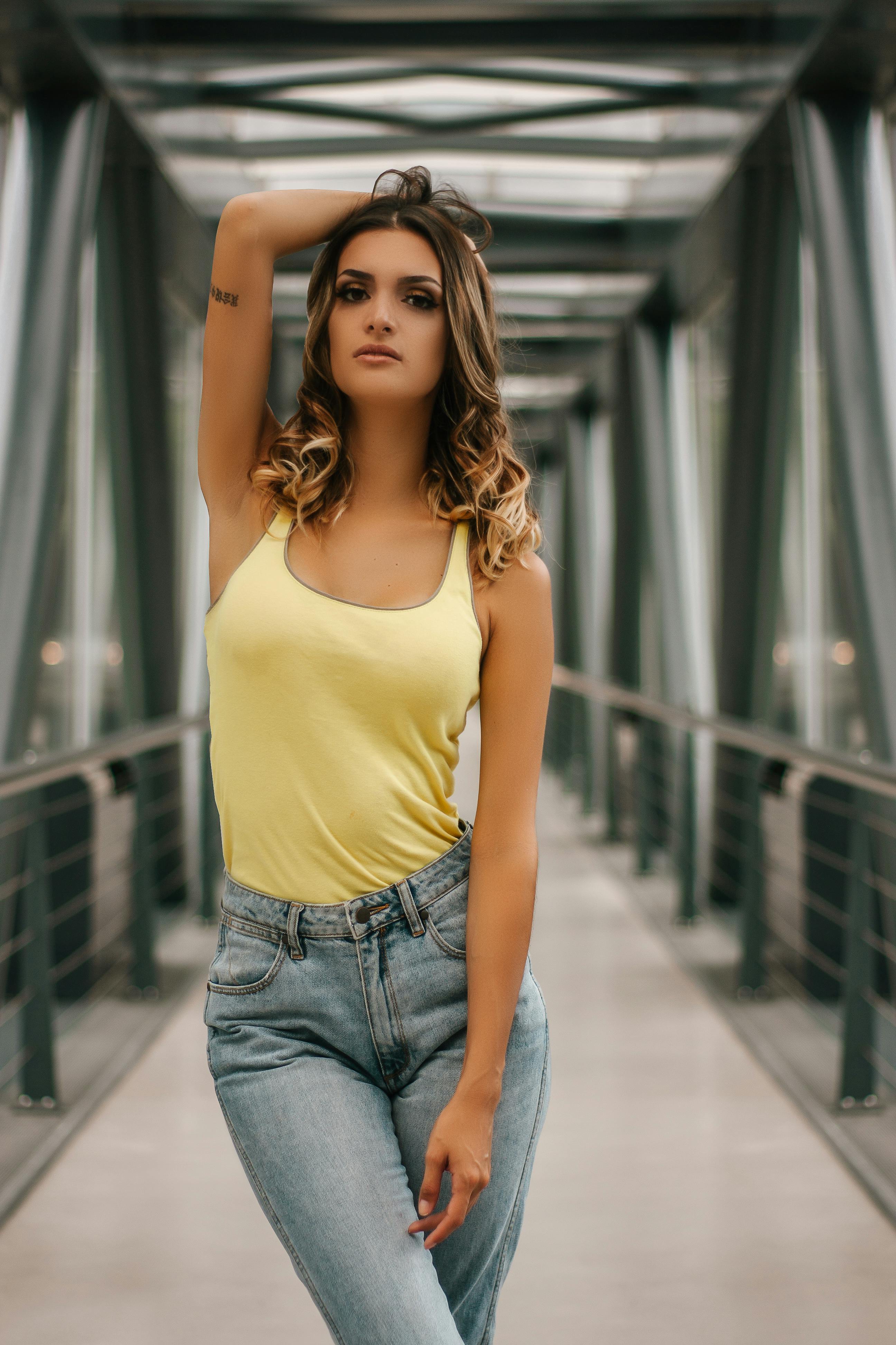 Woman Wearing Yellow Tank Top · Free Stock Photo