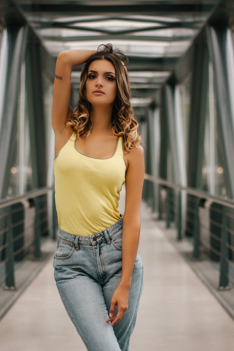 Woman Wearing Yellow Tank Top