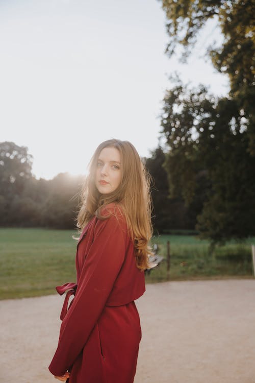 Redhead Model Posing in Coat