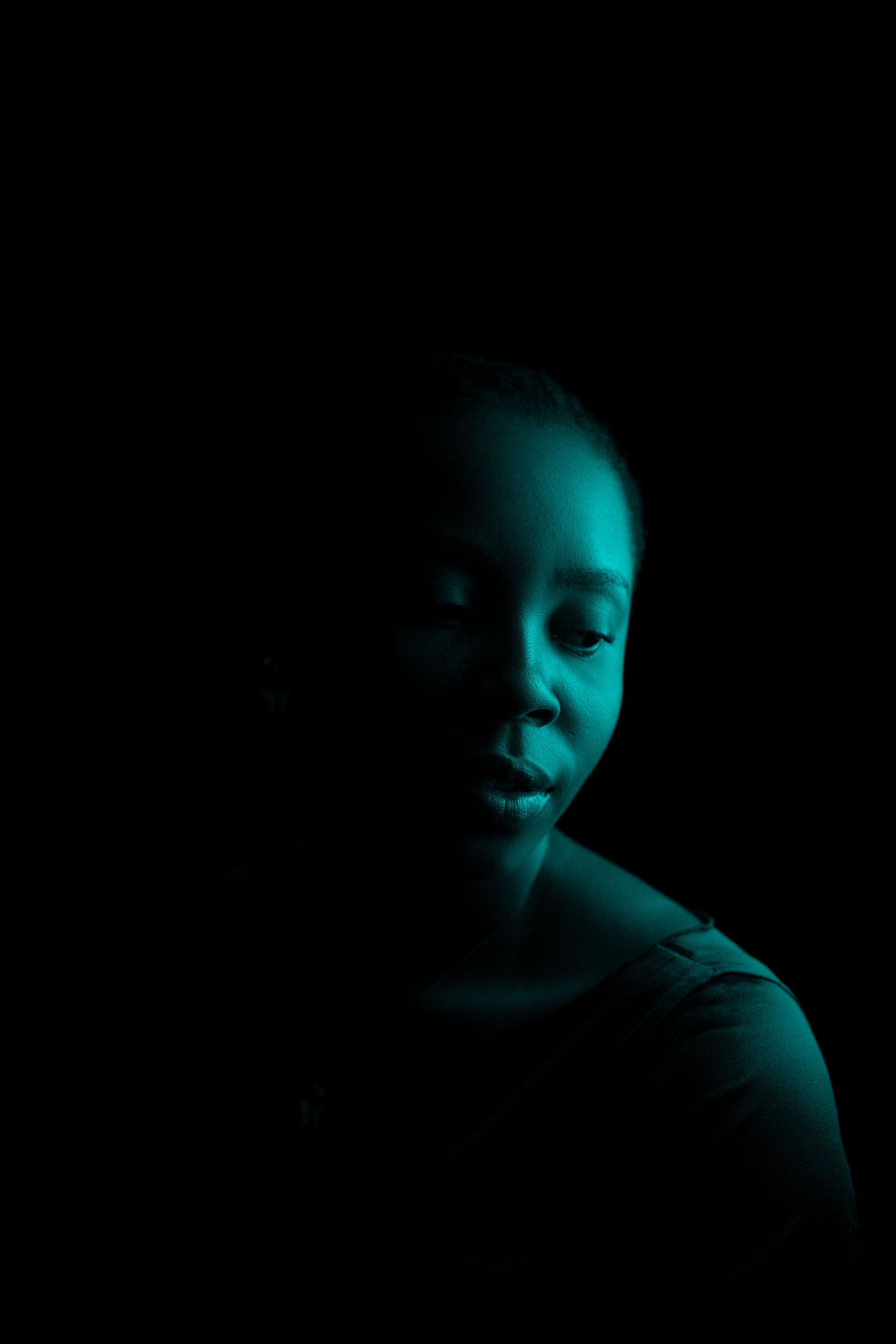 Portrait of African Woman in the Dark · Free Stock Photo