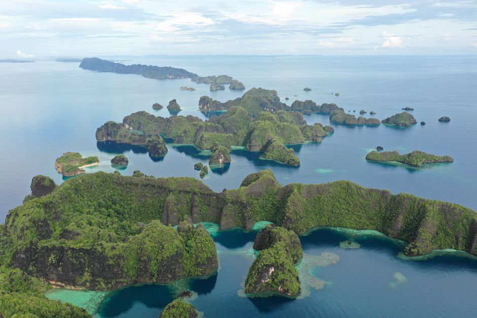 Explore the majestic archipelago of Raja Ampat, Indonesia, from above.