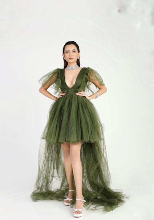 Model Posing in Green Dress