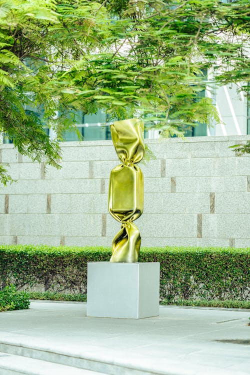 Sculpture of a Golden Wrapped Candy in Dubai, UAE