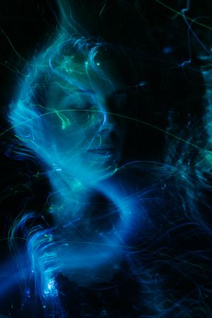 Light-painted portrait in blue and green, by Dominika Poláková on Pexels