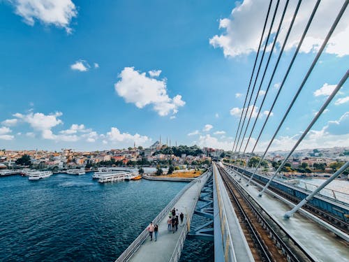 People Walking on Halic Bridge in Istanbul