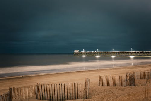 Foto profissional grátis de areia, cais, litoral
