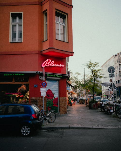 View of a Street and a Red Building in City 