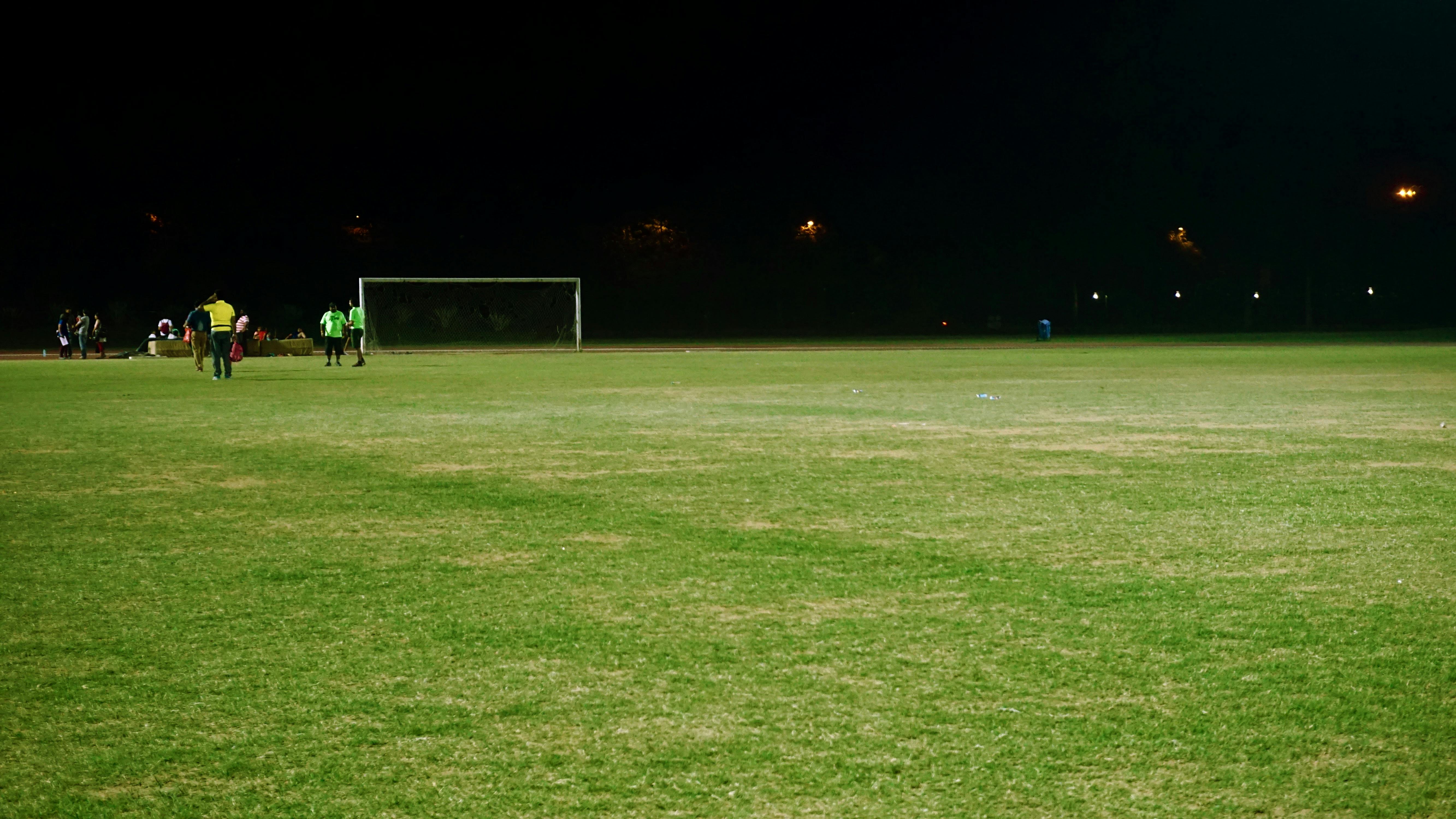 Group of People on Soccer Field