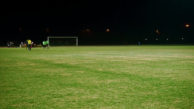 Group Of People On Soccer Field