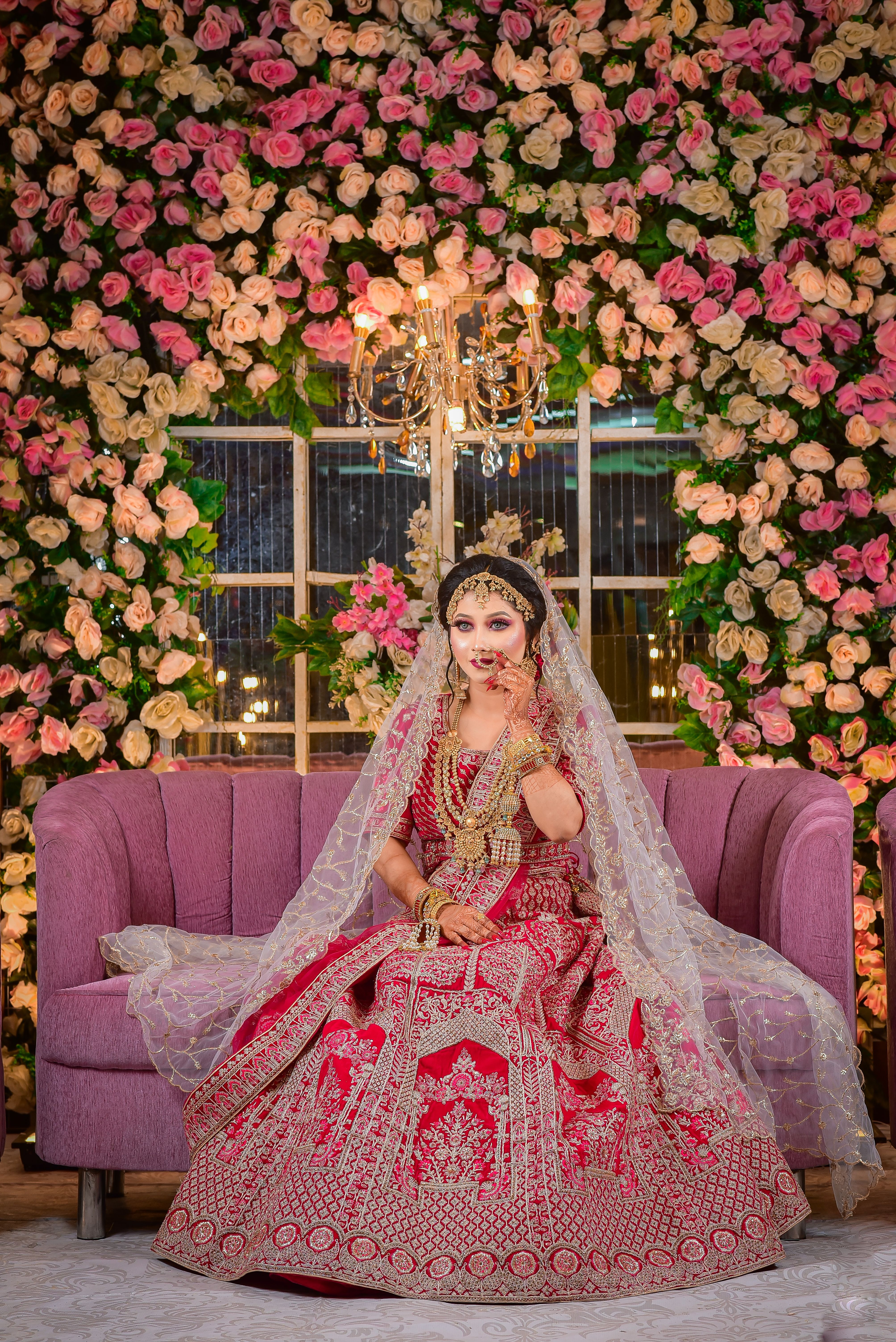 Woman Sitting in Traditional Clothing on Couch · Free Stock Photo