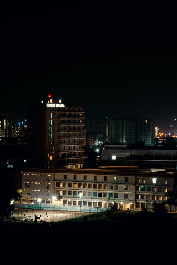 School Building Illuminated At Night