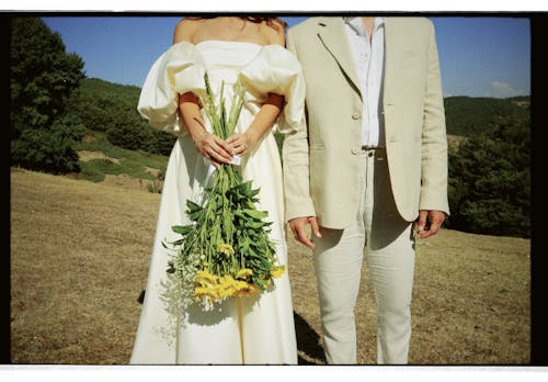 Close up of Newlyweds with Flowers