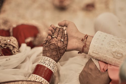 Hands of Traditional Wedding Couple in India