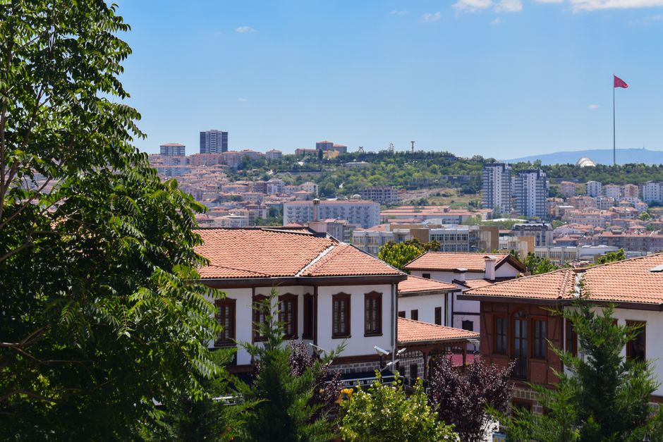 A beautiful blend of traditional and modern architecture in Ankara, Turkey, under a clear summer sky.