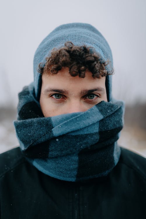 Portrait of Man in Hat and Scarf