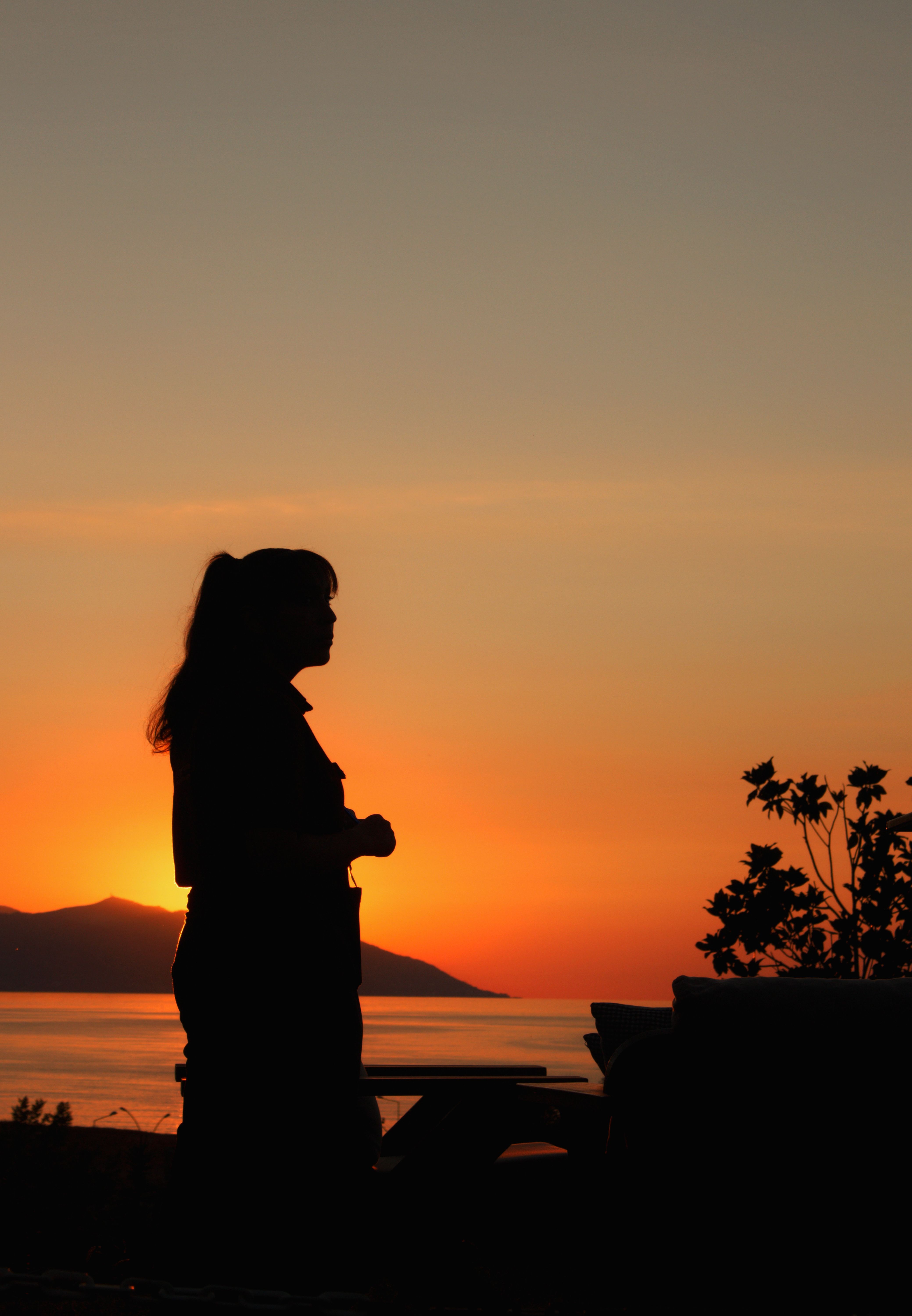 Woman Silhouette at Sunset · Free Stock Photo