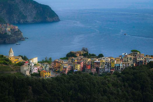 A breathtaking aerial view of Cinque Terre with vibrant houses by the sea in Italy.