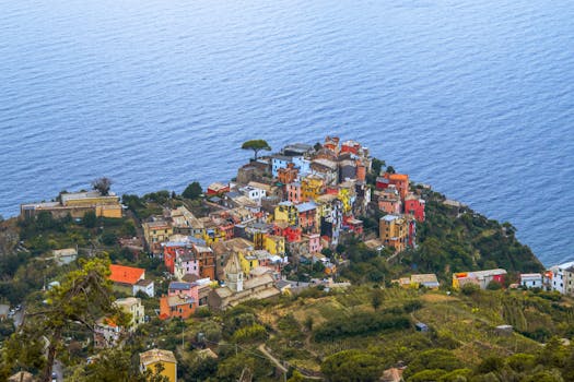 Breathtaking aerial photo of vibrant Cinque Terre village on Italian coast.