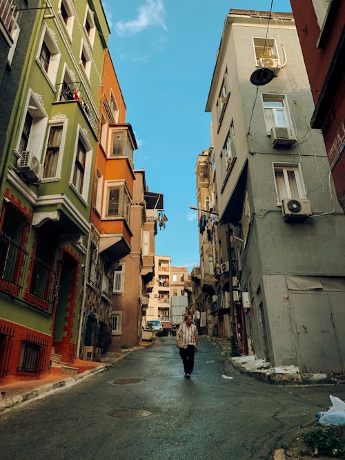 Man Walking on Street in Town in Turkey