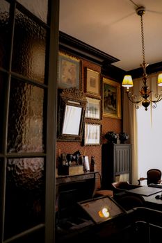 Luxurious Parisian interior design with vintage furniture and ornate decor.