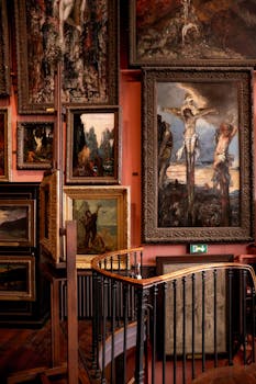 Explore a striking interior of a Parisian art gallery adorned with classical paintings and ornate frames.