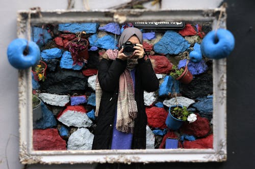 Gratis stockfoto met buiten, fotograferen, hijab