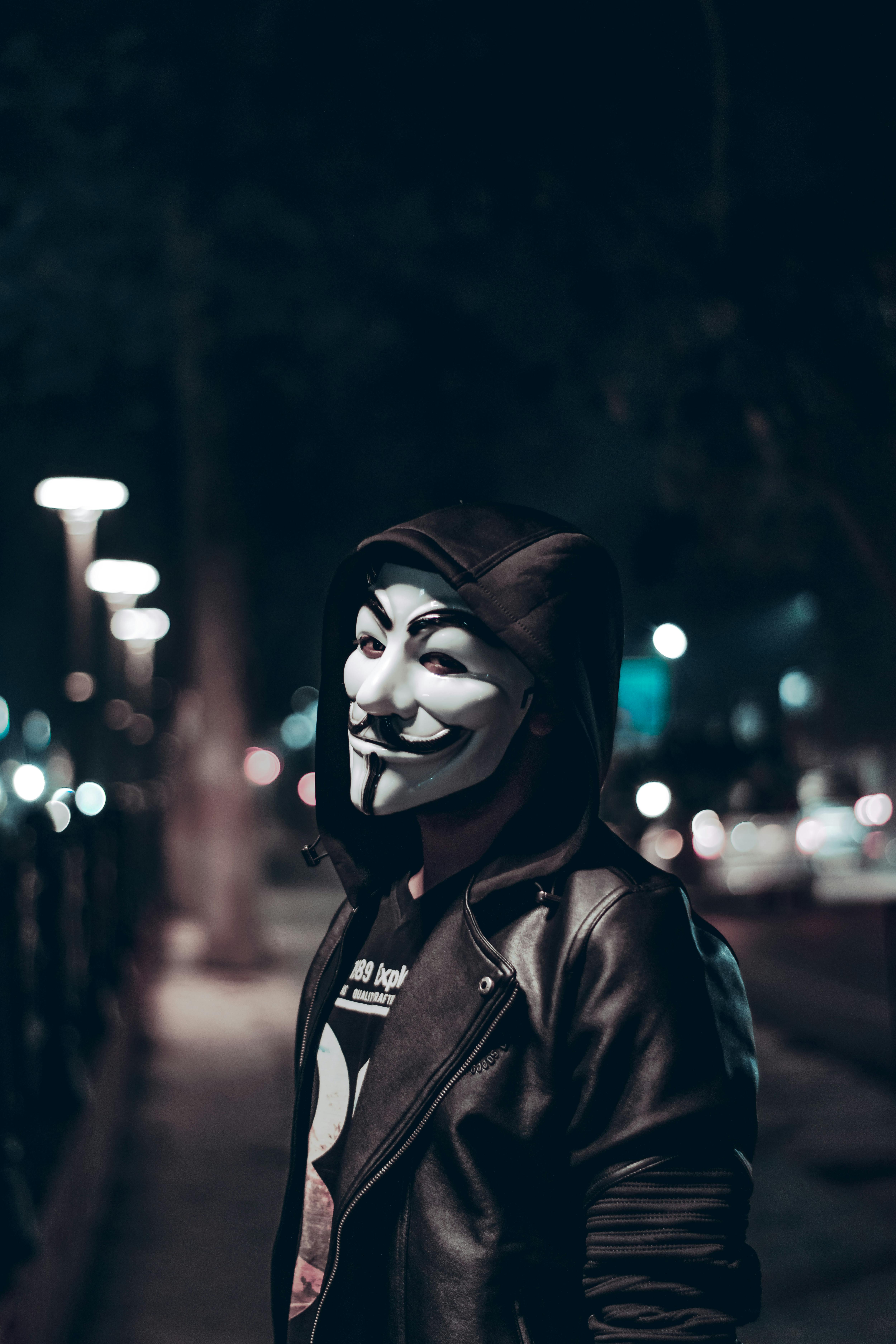 Man Wears A V For Vendetta Guy Fawkes Mask Stock Photo - Download Image Now  - Guy Fawkes, Mask - Disguise, Adult - iStock