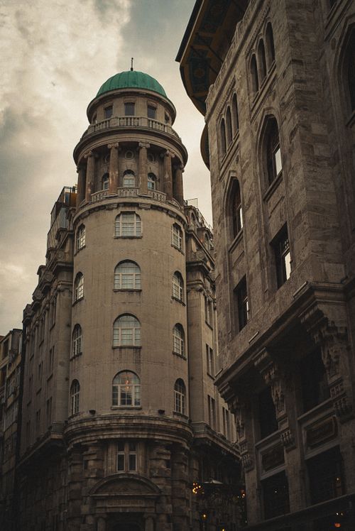 Free Elegant view of historic buildings in Istanbul, showcasing architecture with ornate details and a dome. Stock Photo