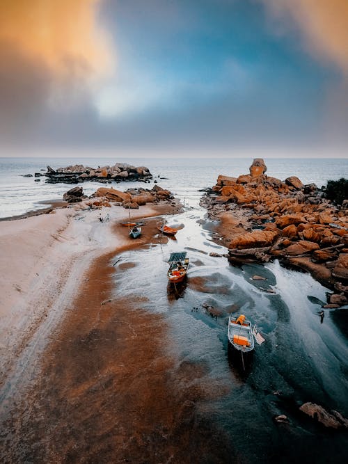 Boats on a Rocky Seashore