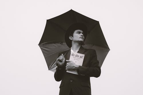 Man in Suit and with Umbrella