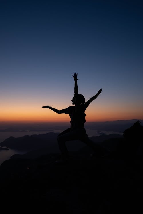 Silhouette of Models Posing at Sunset