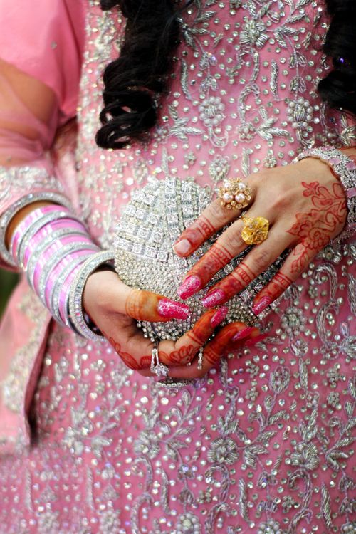Free Captivating image of a bride in ornate traditional attire, showcasing henna and intricate jewelry in Punjab, Pakistan. Stock Photo