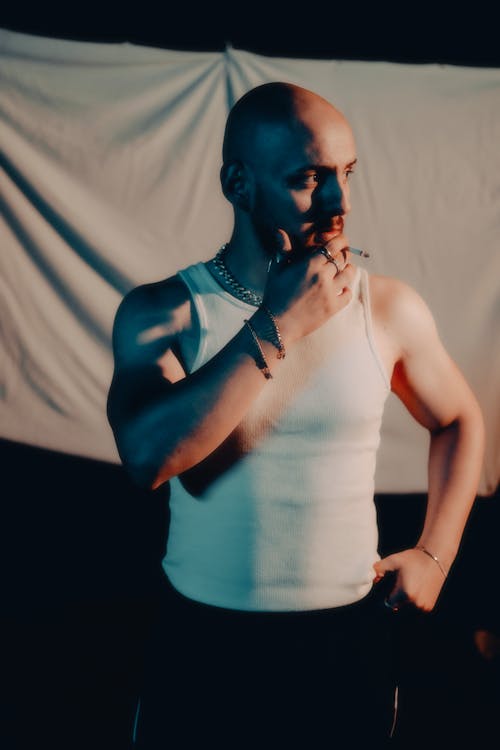 Portrait of Bald Man with Cigarette