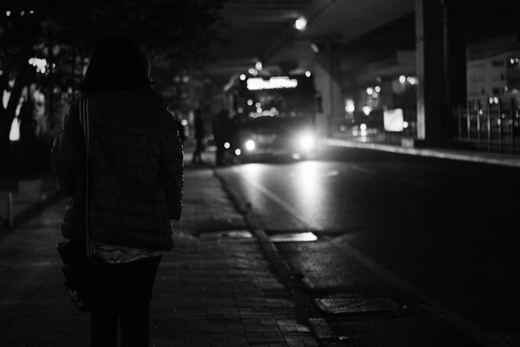 Black Bus Approaching During Nighttime