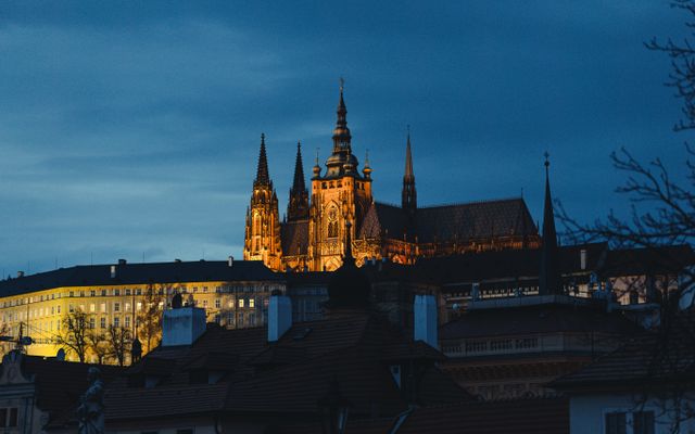 Photo: Eddson Lens on Pexels A mesmerizing view of Prague Castle glowing against the evening sky, a must-see landmark in the Czech Republic.