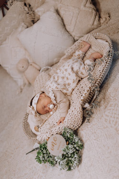 Free Baby Lying Down and Sleeping Stock Photo