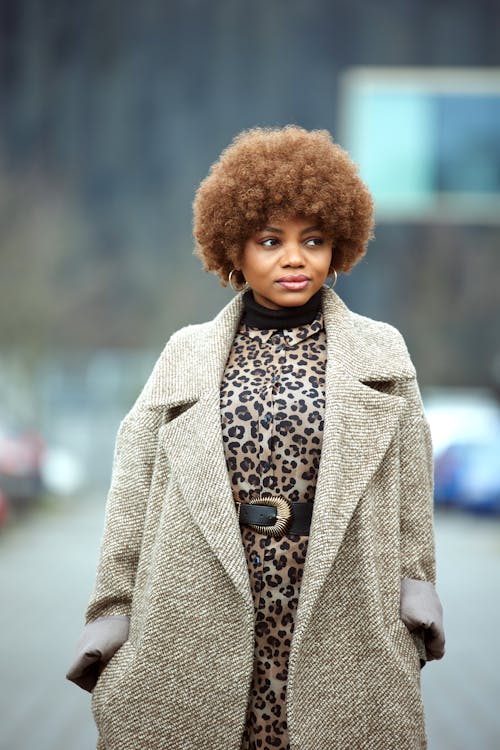 Woman with Short Hair Standing in Coat