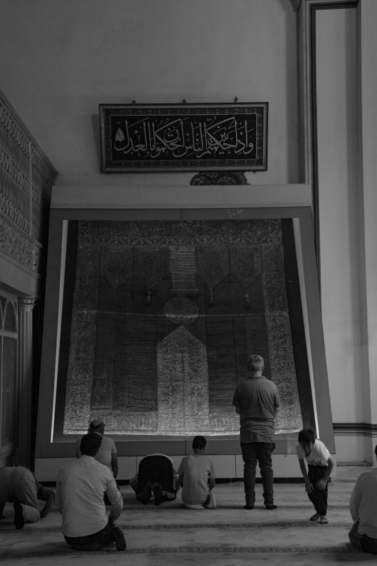 People Praying At Mosque