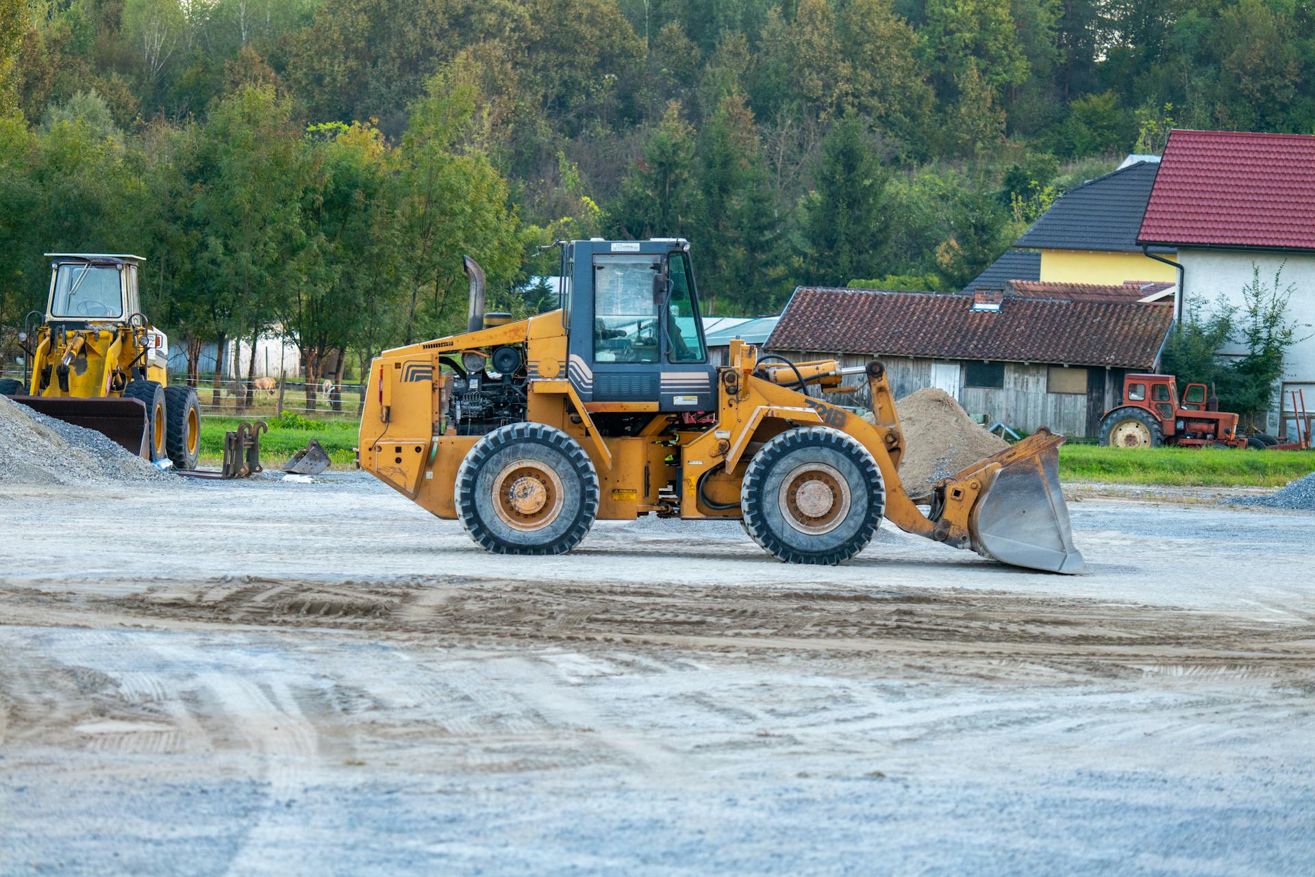 Excavators and bulldozers working at a construction site in Garešnica, Croatia.