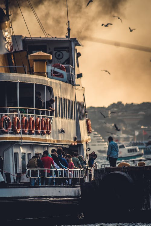 View of People Standing on a Ferry on the Bosporus in Istanbul, Turkey 