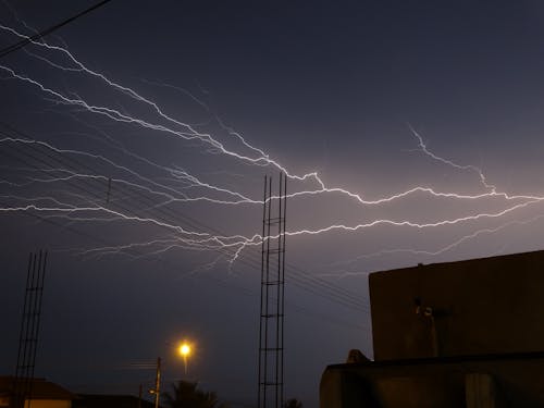 Photos gratuites de bâtiments, ciel spectaculaire, énergie