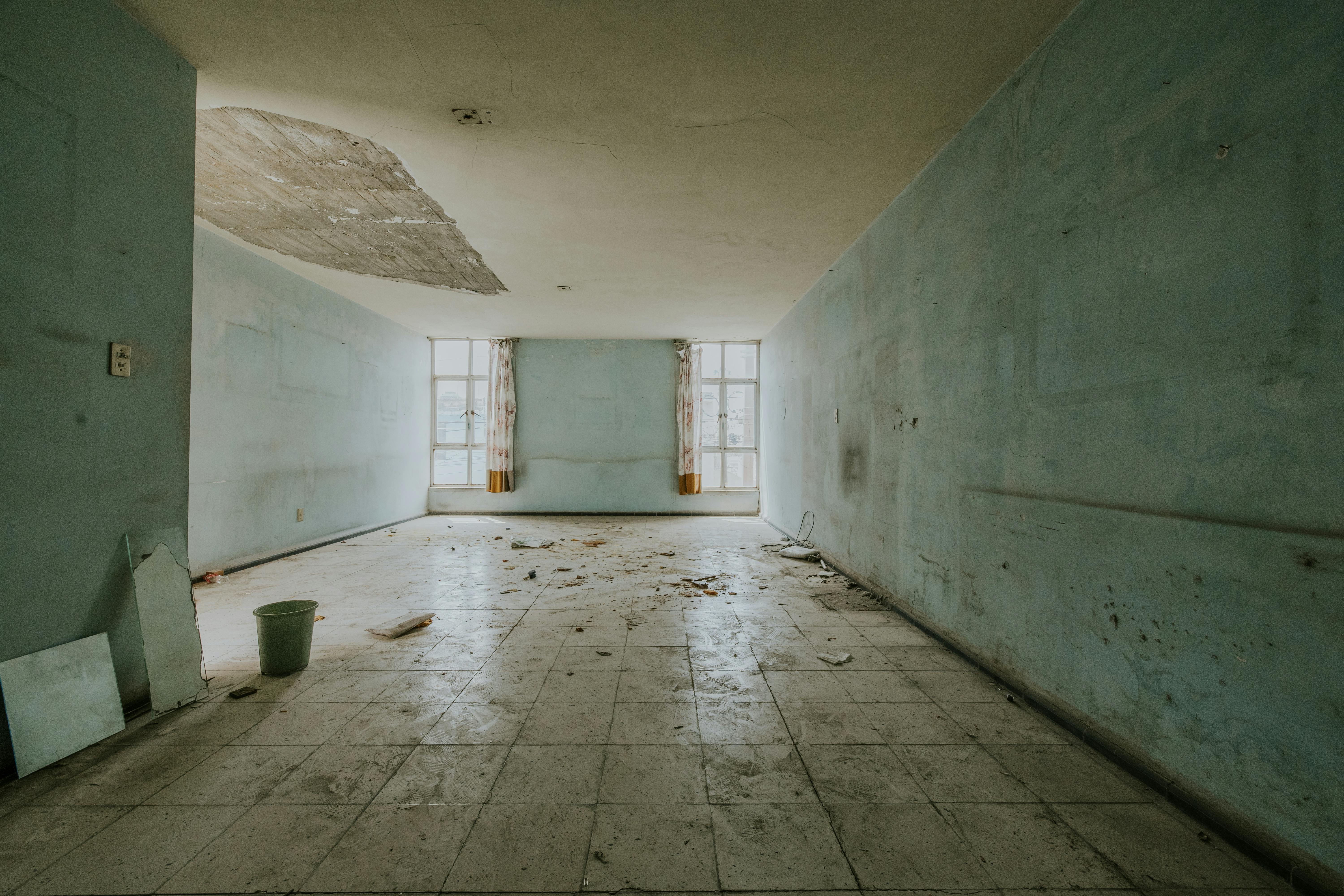 Professional restoration service cleaning and sanitizing water damaged property