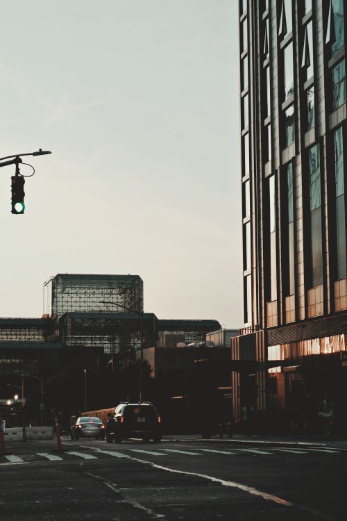 Free Capture of New York City's bustling streets at dusk with iconic high-rises and traffic. Stock Photo