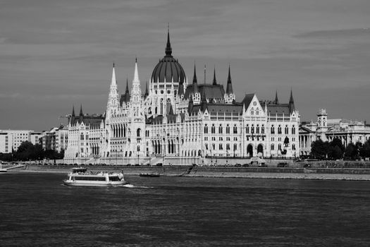 Black and white photo of the Hungarian Parliament on the Danube River, Budapest.