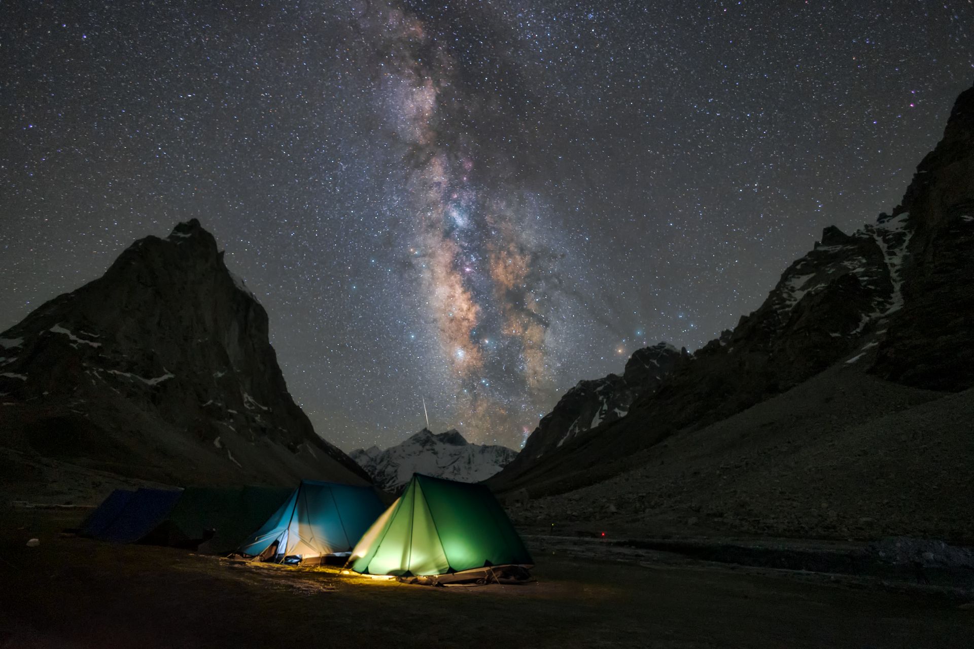 A tent is set up under the milky