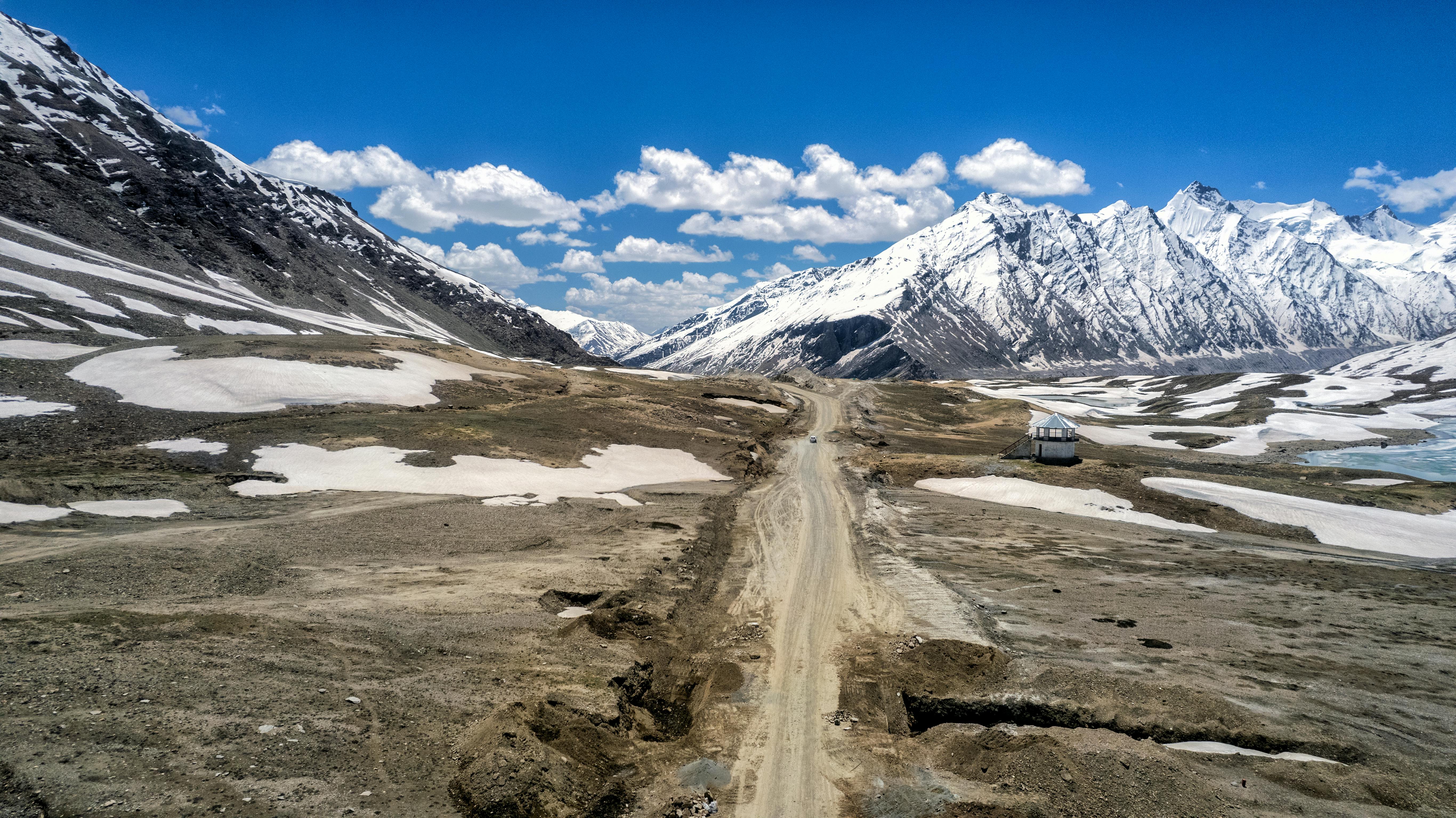 the kargyak river with the granite mountain peak of mount gumbok rangjon on the darcha padum trekking route in the zanskar valley in ladakh