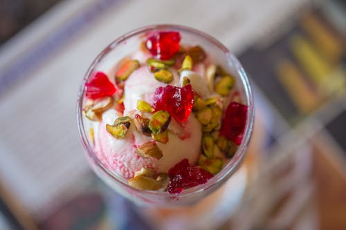Top View of a Dessert with Ice Cream, Jelly and Pistachios 