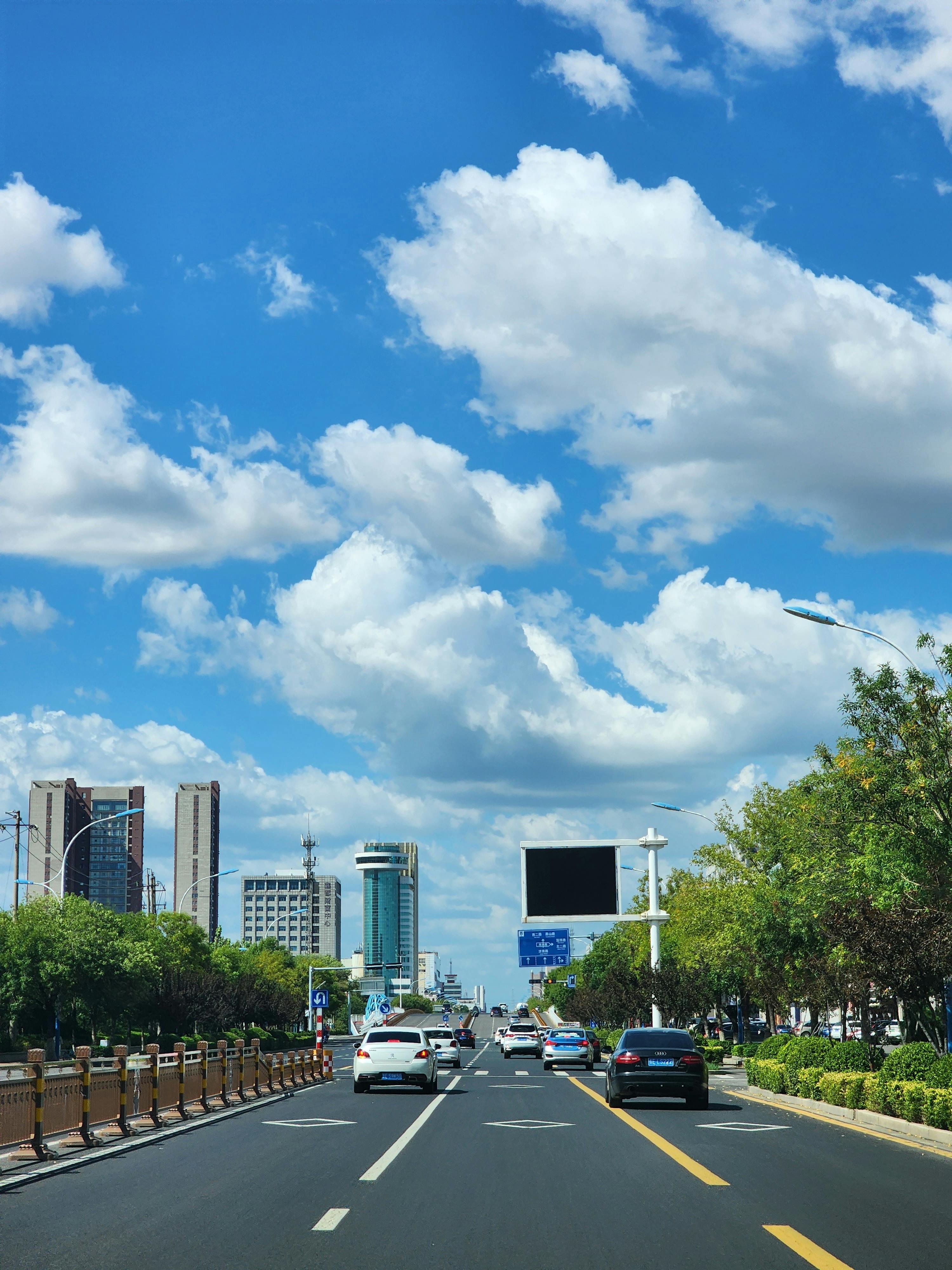 view of a street and skyscrapers in city